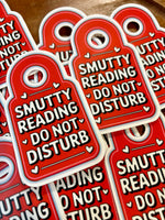 Smutty reading DND sticker