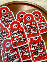 Smutty reading DND sticker