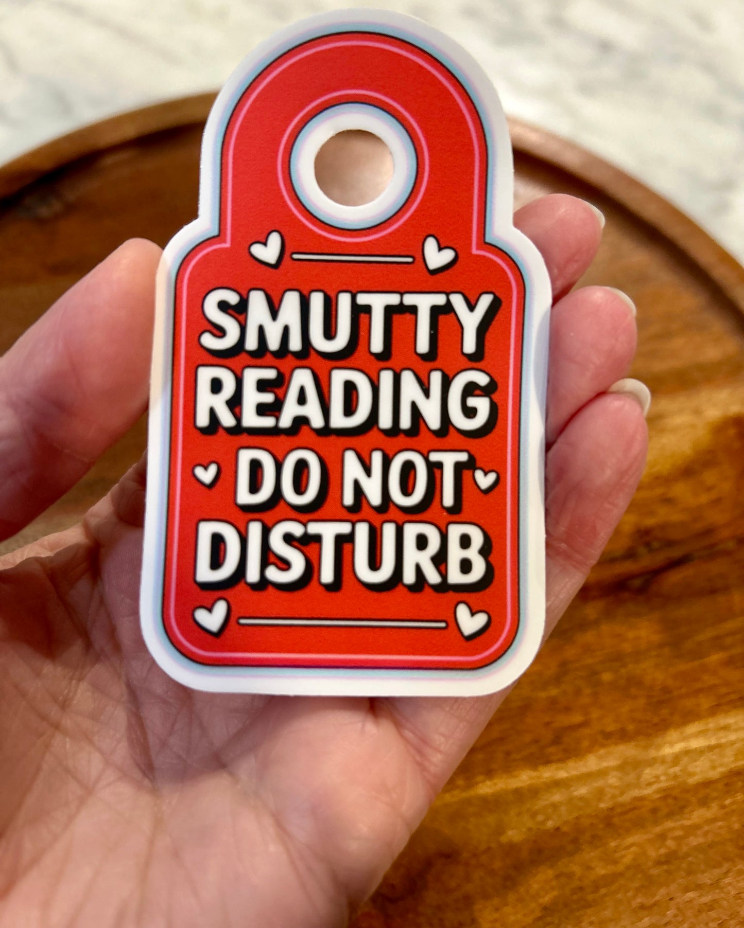 Smutty reading DND sticker