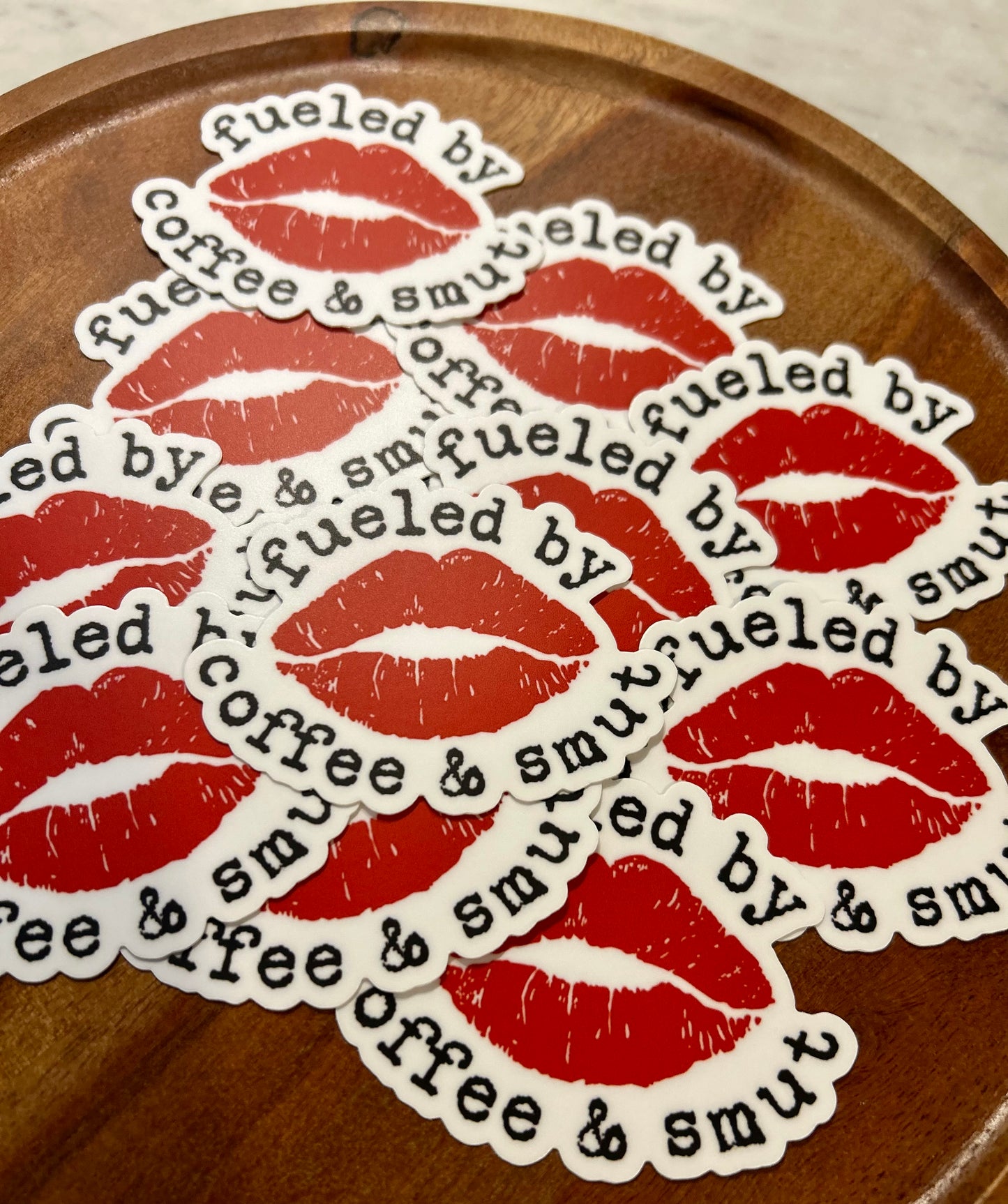 Fueled by coffee & smut Sticker • red