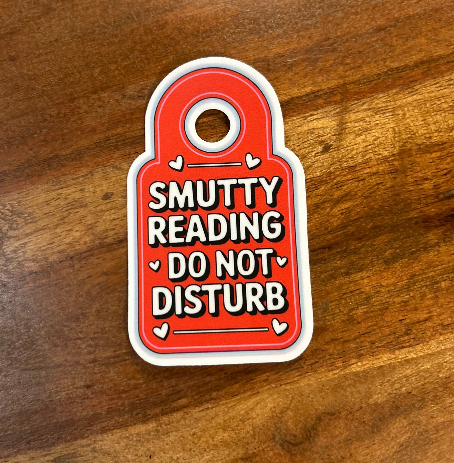 Smutty reading DND sticker