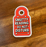 Smutty reading DND sticker
