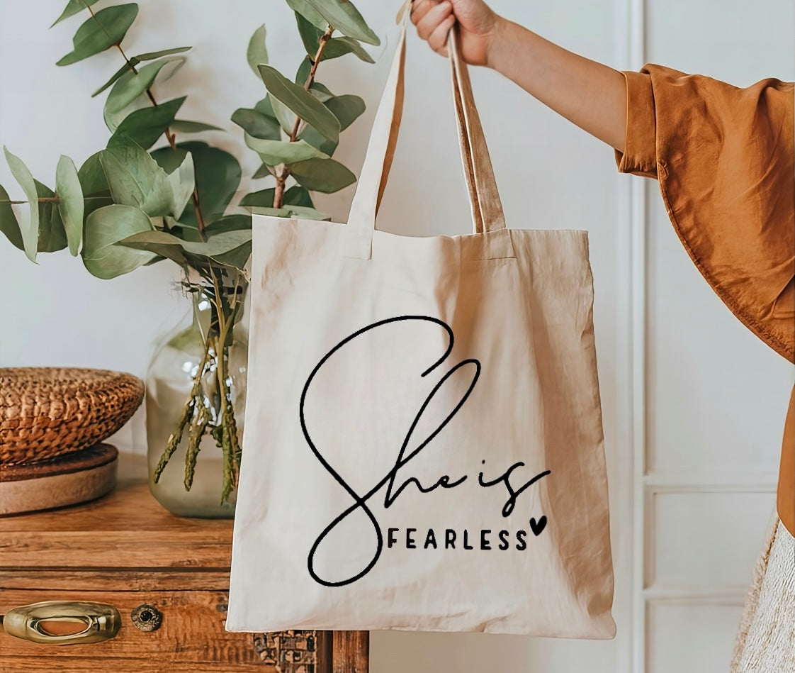 She is fearless tote bag