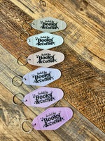 Fueled by books & coffee motel keychain