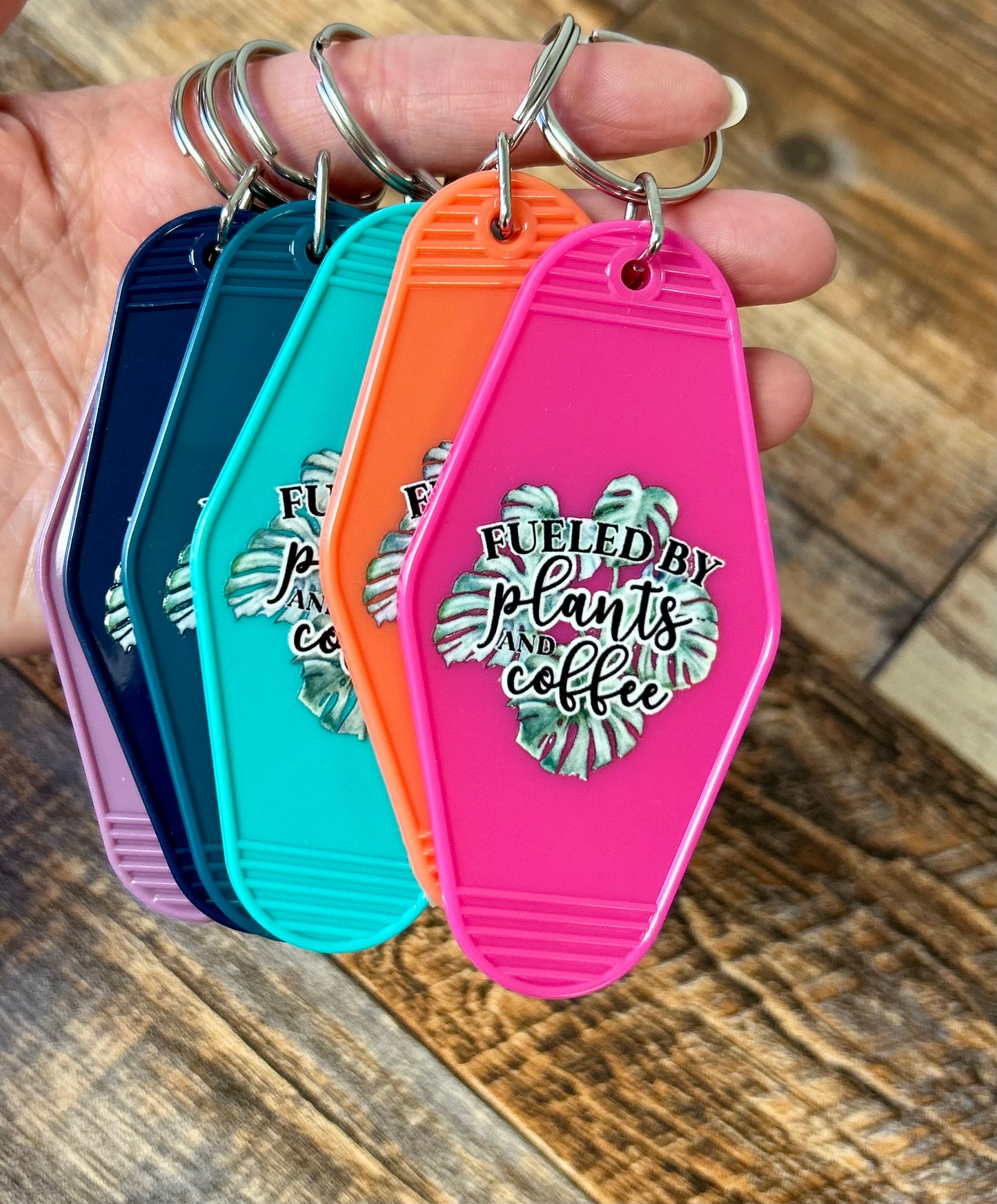 Fueled by plants & coffee motel keychain