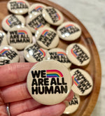 We are all human button