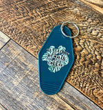 Fueled by plants & coffee motel keychain