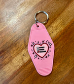 Single taken reading motel keychain