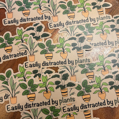 Easily distracted by plants sticker • brown