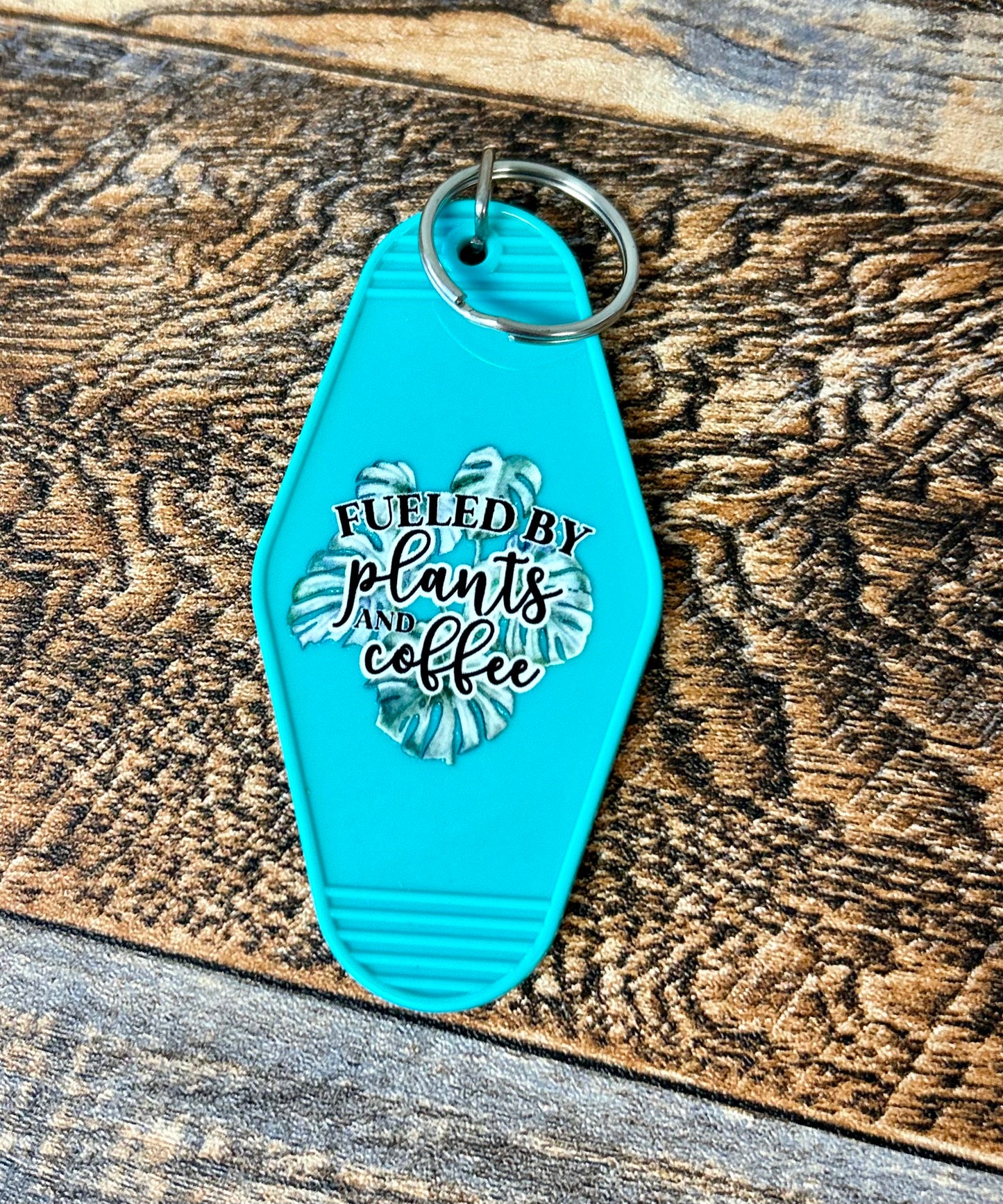 Fueled by plants & coffee motel keychain