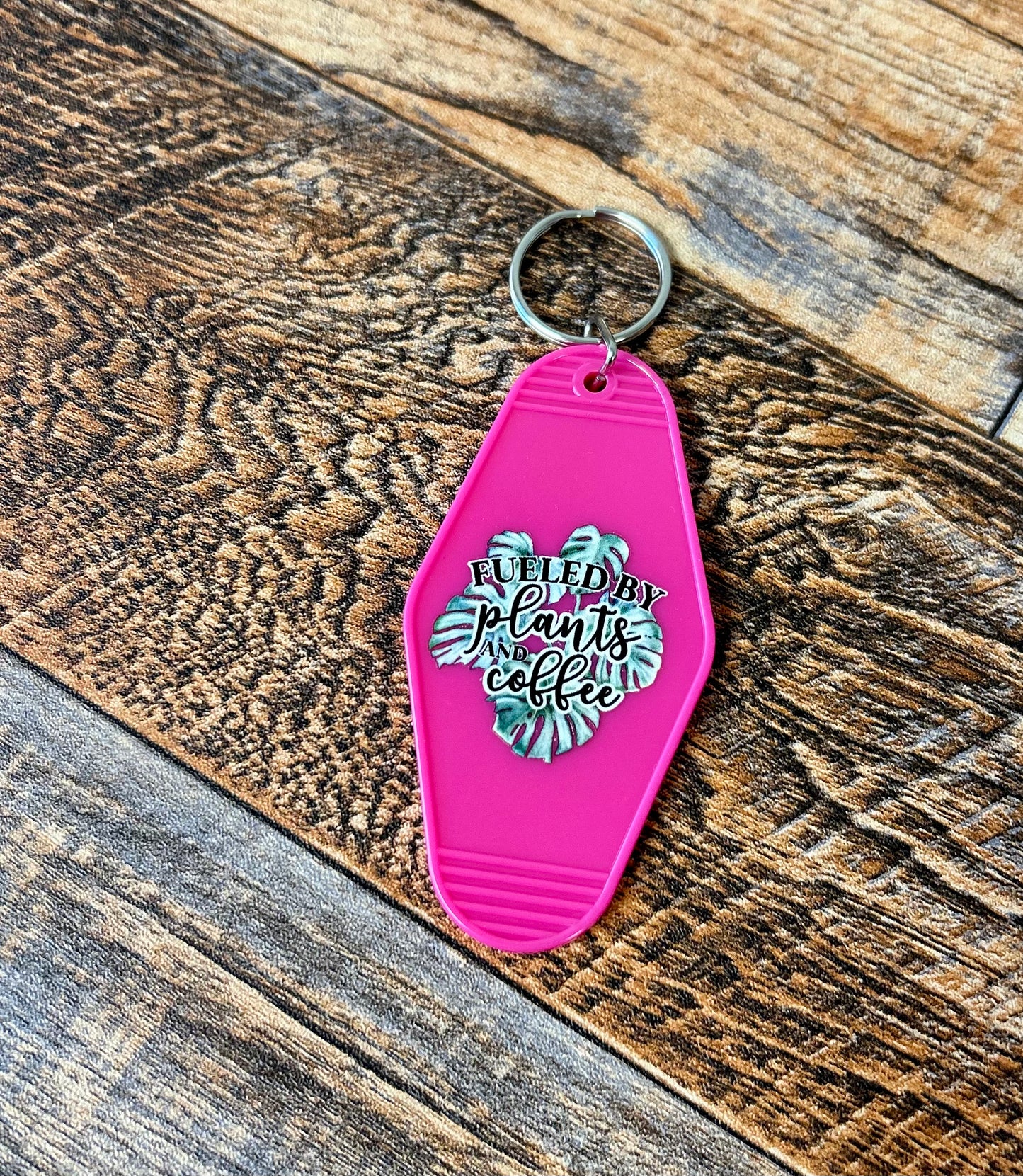Fueled by plants & coffee motel keychain