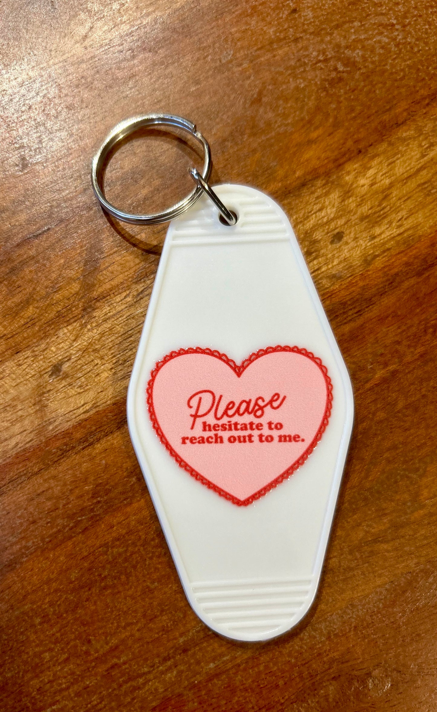 Please hesitate to reach out to me motel keychain