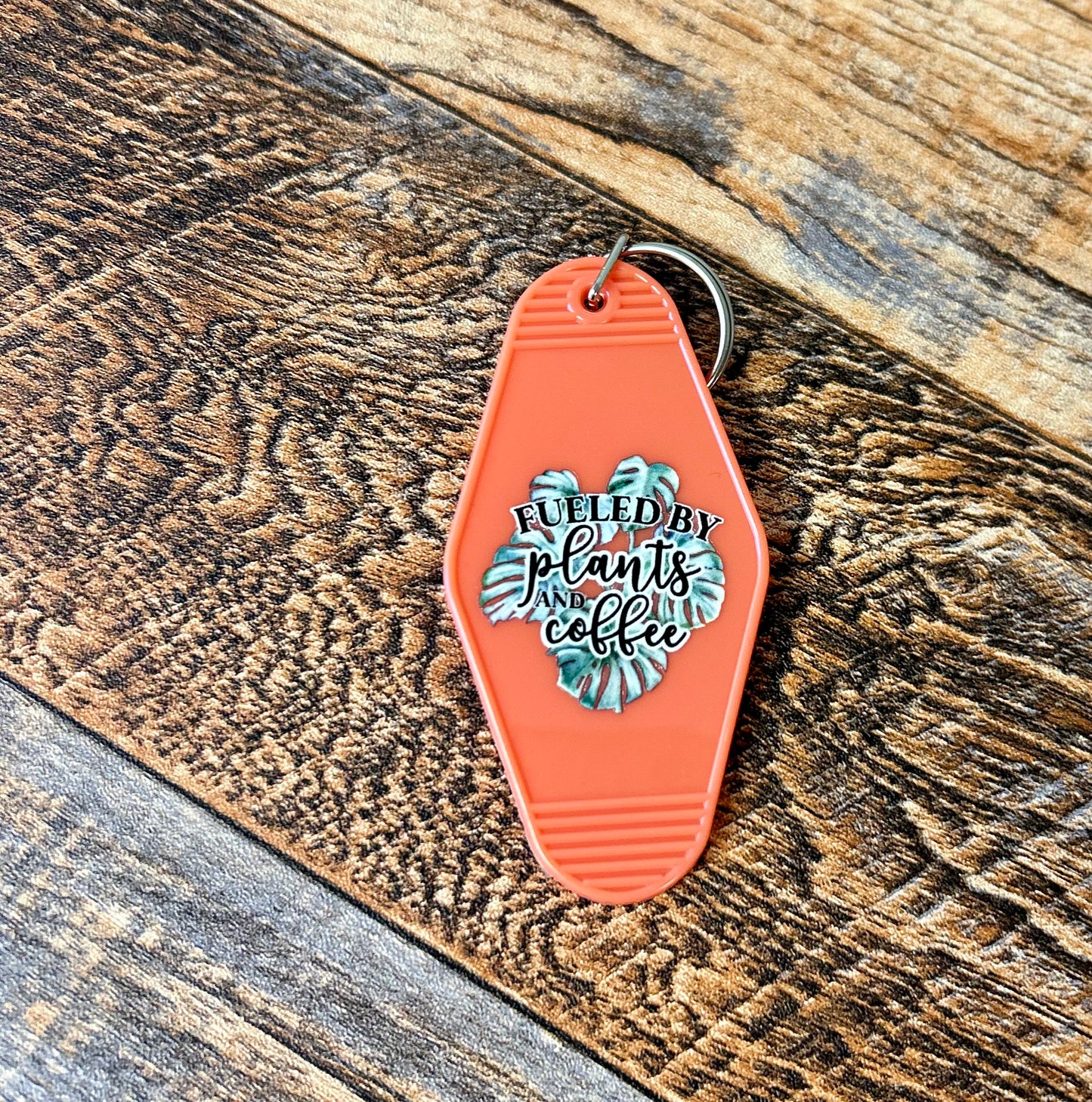 Fueled by plants & coffee motel keychain