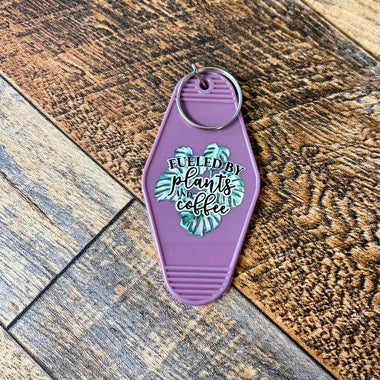 Fueled by plants & coffee motel keychain