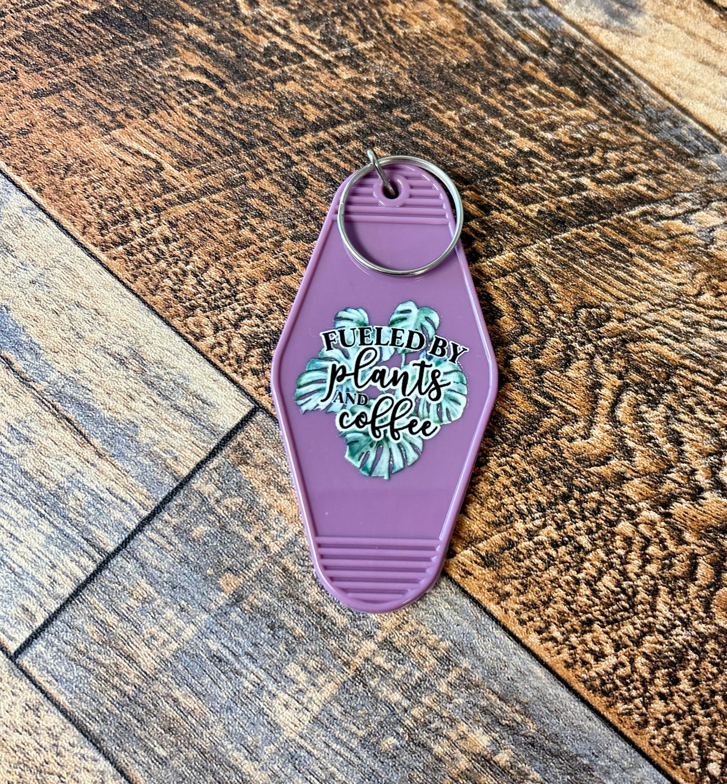 Fueled by plants & coffee motel keychain