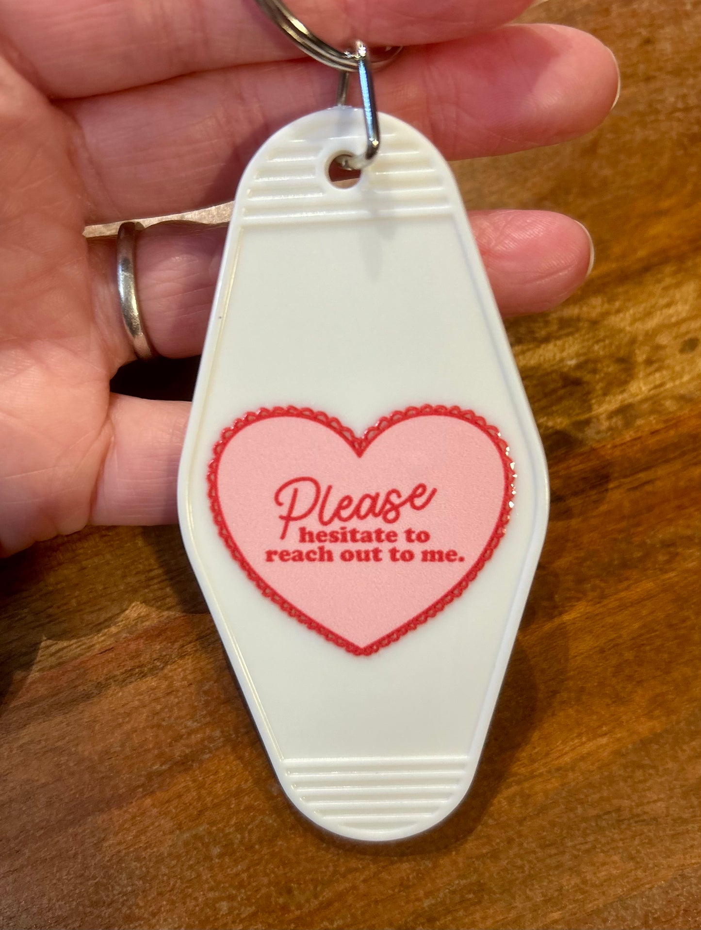 Please hesitate to reach out to me motel keychain