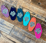 Fueled by plants & coffee motel keychain