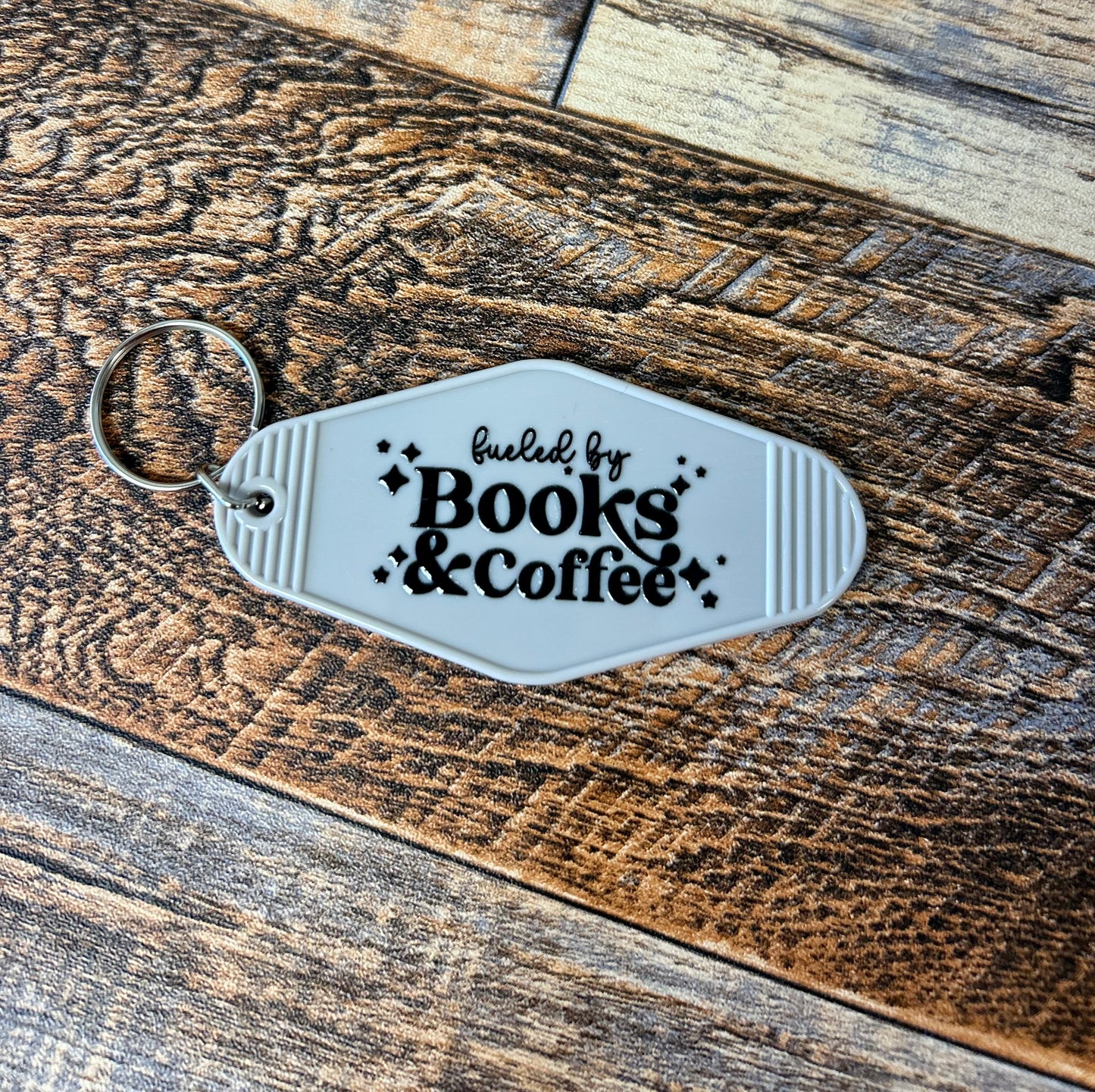 Fueled by books & coffee motel keychain
