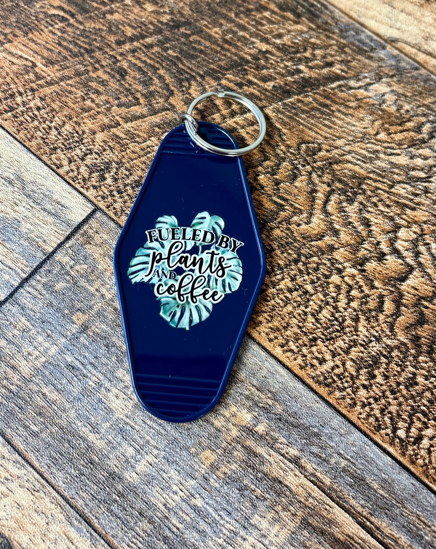 Fueled by plants & coffee motel keychain