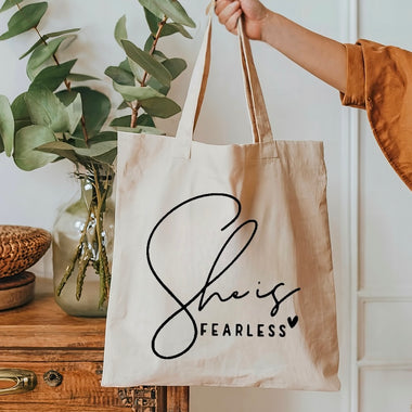 She is fearless tote bag